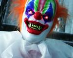 Haunted Hill Farm Life-Size Scary Animatronic Talking Clown with Motion, Touch Activated Lights, and Sounds, Indoor or Covered Outdoor Halloween Decorations, Battery Operated Halloween Prop
