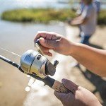 Zebco 33 Gold Spincast Fishing Reel, Changeable Right or Left-Hand Retrieve, All-Metal Gears, Pre-Spooled Cajun Fishing Line, Silver/Gold