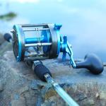 Sougayilang F47 Baitcasting Fishing Reel - Reinforced Metal Body Round Baitcaster for Smooth Powerful Saltwater Inshore Surf Trolling - Conventional Reel for Catfish, Musky, Bass, Pike