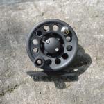 FANGBLUE Ice Fishing Reel ABS 2.4inch(6cm) Mini Fly Wheel for Trout Pike Lightweight Interchangeable Winter Fishing Wheel for Freshwater Saltwater (Black)