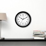 10-Inch Self-Setting Analog Wall Clock in Black/Silver