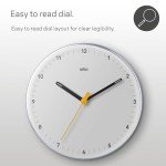 Braun Classic Analogue Wall Clock with Silent Sweeping Quartz Movement, Easy to Read, 23cm Diameter in White, Model BC26W.