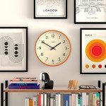 JONES CLOCKS® Studio Round Wall Clock - Round Clock - Modern Clock - Designer Clock - Kitchen Clock - Living Room Clock - Office Clock - Easy to Read Dial - Contemporary Design (Orange)