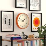JONES CLOCKS® Studio Round Wall Clock - Round Clock - Modern Clock - Designer Clock - Kitchen Clock - Living Room Clock - Office Clock - Easy to Read Dial - Contemporary Design (Orange)