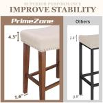 PrimeZone Counter Height Bar Stools Set of 2 - Backless Saddle Barstools with 4.3" Thick Upholstered, Nailhead Trim Linen Fabric & Solid Wood Legs, 26 Inch Counter Stools for Kitchen Island, Beige