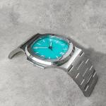 Modern watch coffee table, tempered glass countertop, simple stainless steel living room table