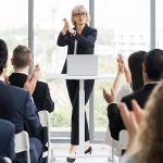 DUMOS Small Standing Desk Mobile Portable Rolling Laptop PC Table on Wheels Adjustable Height Computer Workstation for Home Office, 19 Inch, Modern White