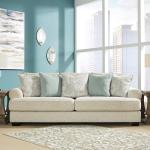 Signature Design by Ashley Monaghan Vintage Sofa with Accent Pillows, Reversible Cushions and Rolled Arms, Beige