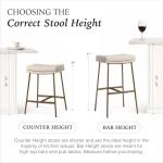 Maven Lane Berkley Backless Counter Stool 26 Inch – Saddle Stool with Footrest – Aged Gold Metal Frame & Beige Fabric Upholstery – Perfect for Kitchen Island & Counters