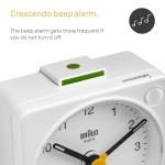 Braun Classic Travel Analogue Alarm Clock with Snooze and Light, Compact Size, Quiet Quartz Movement, Crescendo Beep Alarm in White, Model BC02XW.