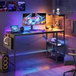 Bestier Gaming Desk with LED Lights, 51.3 Inch Computer Desk with 4 Tiers Reversible Shelves, Home Office Writing Desk with Side Storage Bag, Hooks and Height Adjustable Shelf (Black Grained)