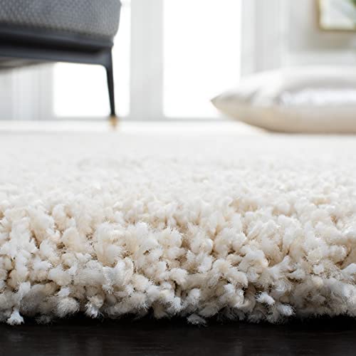 Ivory 10' x 14' Stained Area Rug