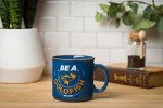 Silver Buffalo Ted Lasso Be a Goldfish Ceramic Camper Mug, 20 Ounces