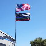 The Traveler Two Flag RV Ladder Flag Pole Kit. Includes Two Beautiful 3’x5’ Flags, Steel RV Flag pole Mount, Fits Standard 1” RV Ladders,14ft Fiberglass Retractable Pole, And A Storage Bag.