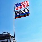 The Traveler Two Flag RV Ladder Flag Pole Kit. Includes Two Beautiful 3’x5’ Flags, Steel RV Flag pole Mount, Fits Standard 1” RV Ladders,14ft Fiberglass Retractable Pole, And A Storage Bag.