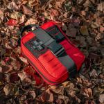 Compact First Aid Kit with Survival Tools - Red