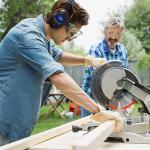 Gardtech Hearing Protection with Bluetooth, FM Radio Earmuffs, NRR 29dB Hearing Protection Headphones Noise Cancelling Headphones with MP3 for Mowing Lawn Work, Rechargeable BL-5B Battery (Orange)