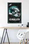 Trends International NFL Philadelphia Eagles - Neon Helmet 23 Wall Poster, 34L x 22.4W, Unframed Version