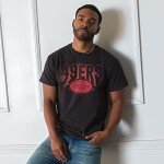 Junk Food Clothing x NFL - San Francisco 49ers - Team Spotlight - Unisex Adult Short Sleeve Fan T-Shirt for Men and Women - Size XX-Large