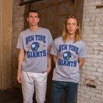 Junk Food Clothing x NFL - New York Giants - Team Helmet - Unisex Adult Short Sleeve Fan T-Shirt for Men and Women - Size Large
