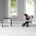 Franklin Sports Los Angeles Kings Mini Hockey Set - Knee Hockey Goal, Ball, & 2 Hockey Stick Combo Set - Mini Goal Net - NHL Official Hockey Set , 28" x 20" x 12"