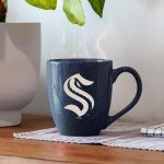 Rico Industries NHL Hockey Seattle Kraken Navy 16 oz Team Color Laser Engraved Speckled Ceramic Coffee Mug