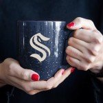 Rico Industries NHL Hockey Seattle Kraken Navy 16 oz Team Color Laser Engraved Speckled Ceramic Coffee Mug