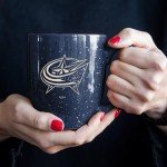 Rico Industries NHL Hockey Columbus Blue Jackets Navy 16 oz Team Color Laser Engraved Speckled Ceramic Coffee Mug