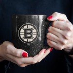 Rico Industries NHL Hockey Boston Bruins Black 16 oz Team Color Laser Engraved Speckled Ceramic Coffee Mug