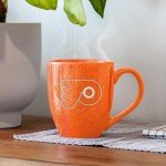 Rico Industries NHL Hockey Philadelphia Flyers Orange 16 oz Team Color Laser Engraved Speckled Ceramic Coffee Mug