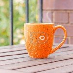 Rico Industries NHL Hockey Philadelphia Flyers Orange 16 oz Team Color Laser Engraved Speckled Ceramic Coffee Mug