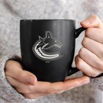 Rico Industries NHL Hockey Vancouver Canucks 15oz Laser Engraved Matte Black Ceramic Bistro Mug - For Hot or Cold Drinks