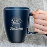 Rico Industries NHL Hockey Columbus Blue Jackets Sunburst 18oz Laser Engraved Ceramic Lustre Mug