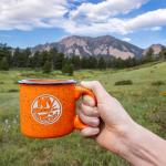 Rico Industries NHL Hockey New York Islanders Orange Speckle 12oz Laser Engraved Campfire Mug