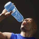 Party Animal NFL Football Squeeze Bottle, 32 oz BPA-Free Sports Water Bottle with Quick Flow for Kids & Adults, Detroit Lions