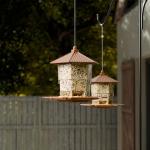 Yieach Hopper Bird Feeders for Outdoors Hanging,Large Birdfeeders for Outside Squirrel Proof,Covered Bird Seed Feeder for Outside,Plastic Wild Bird Feeder for Blue Jay,Cardinal,Garden Decoration,Brown