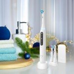 Oral-B iO Deep Clean   Whiten Rechargeable Electric Toothbrush with Visible Pressure Sensor, 2 Minute Timer, 5 Cleaning Settings, 1 iO5 Limited, 3 Toothbrush Heads, Travel Case & Refill Holder, White