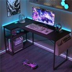 TIQLAB Small Computer Desk with Power Outlets, 40 Inch L Shaped Desk with Reversible Shelves, Gaming Desk Corner Desk Study Writing Table for Home Office Bedroom Living Room, Black