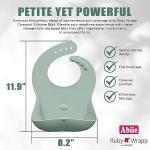 Abiie Ruby Wrapp Silicone Bibs for Babies - Waterproof Bib Made with Stain Resistant Material - Front Pocket for Catching Food - Silicone Toddler Bibs (Sage Green)