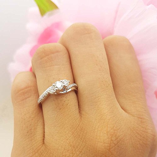 1/2 CT White Gold 3 Stone Diamond Swirl Ring