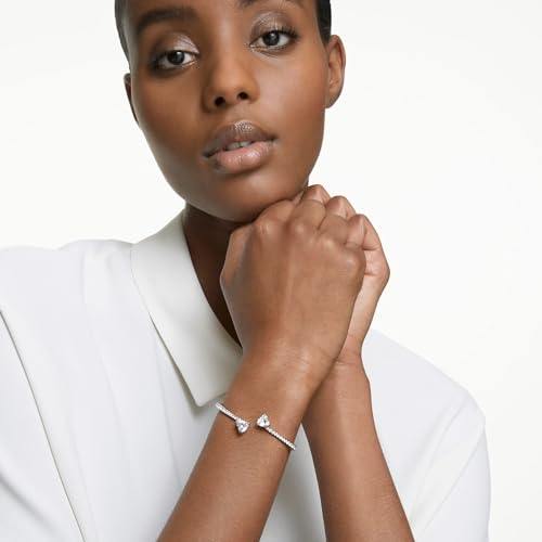 SWAROVSKI Attract Soul Heart Bangle Bracelet, Heart-Shaped Clear Crystals on a Rhodium Finish Cuff, Size M, from the Attract Soul Collection