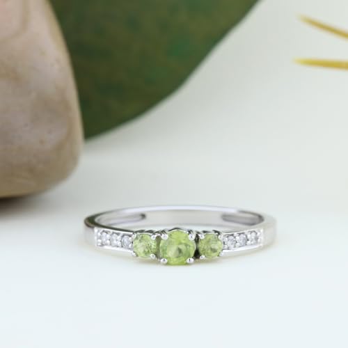 Peridot and White Diamond Three Stone Engagement Ring