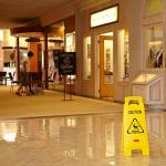 Rubbermaid 26-Inch Multilingual Caution Sign - Yellow