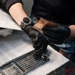 Schneider Black Vinyl Disposable Exam Gloves, 50 Pack