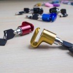 Compact Disc Lock for ATV and Scooter Security