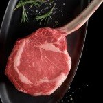 Premium long-bone Tomahawk Ribeye Steaks - A Perfect Delight for Special Moments with Cooking Instructions from Kansas City Steaks (4 Tomahawk Steaks, 34 oz each)