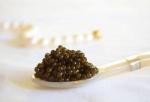 4.4 OZ. Kaluga Caviar, Sturgeon Black Caviar, Kaluga Hybrid Imperial Grade, (125 grams). Includes 2 Mother of Pearl Spoons, Tin Opener, Insulated Cooler Bag, Velvet Pouch.
