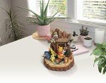 Enesco Disney Traditions by Jim Shore Winnie The Pooh Mount Sanders Carved by Heart Figurine, 7.48 Inch, Multicolor