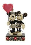 Enesco Jim Shore Disney Traditions Mickey and Minnie Mouse Heart Figurine, 7.25 Inch, Multicolor