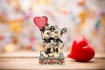 Enesco Jim Shore Disney Traditions Mickey and Minnie Mouse Heart Figurine, 7.25 Inch, Multicolor